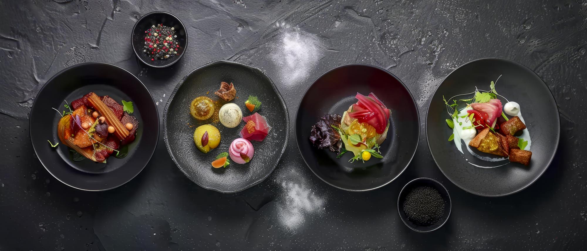 Set of plated tasting dishes on slate